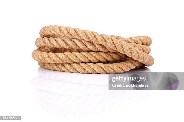 coiled rope isolated on a white background - snöre bildbanksfoton och bilder