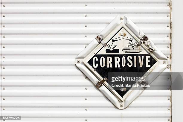 semi trailer corrosive warning placard - placard stock pictures, royalty-free photos & images