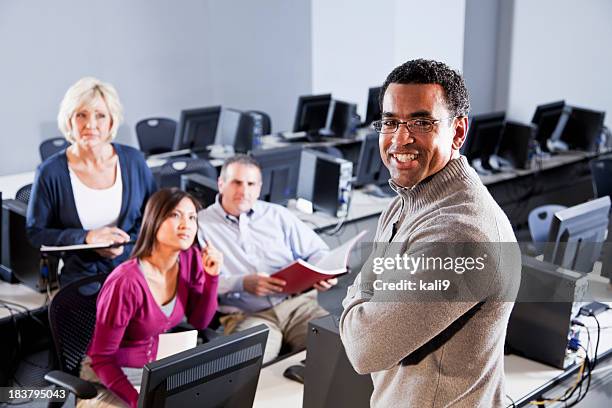 Instructor In Front Of Classroom Photos and Premium High Res Pictures ...