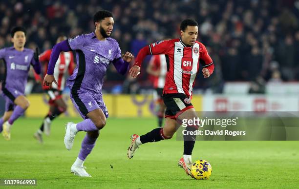 Cameron Archer of Sheffield United breaks away from Joe Gomez during the Premier League match between Sheffield United and Liverpool FC at Bramall...