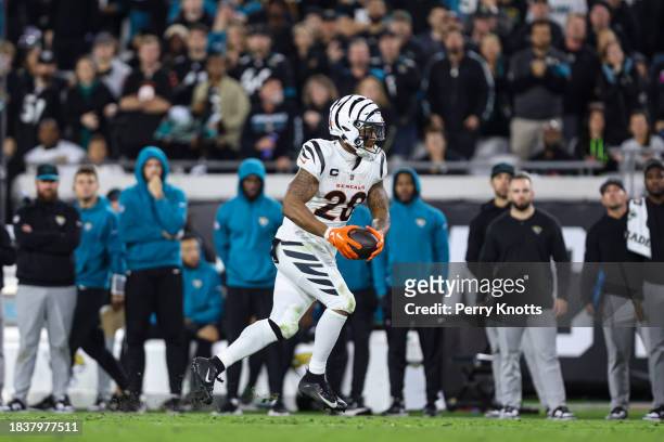 Turner II of the Cincinnati Bengals runs the ball during an NFL football game against the Jacksonville Jaguars at EverBank Stadium on December 4,...