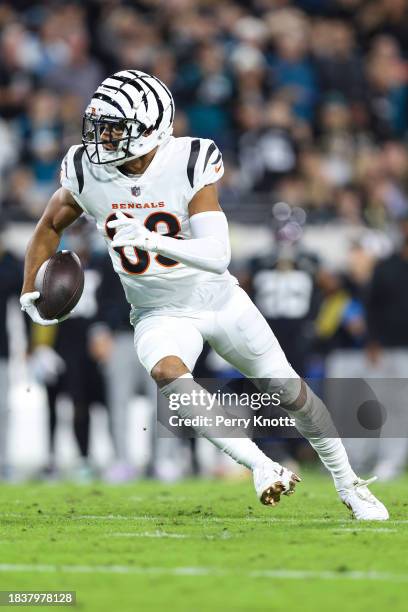 Tyler Boyd of the Cincinnati Bengals runs the ball during an NFL football game against the Jacksonville Jaguars at EverBank Stadium on December 4,...