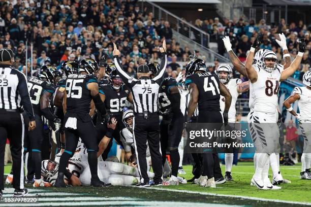 The Cincinnati Bengals celebrate after scoring a touchdown during an NFL football game against the Jacksonville Jaguars at EverBank Stadium on...