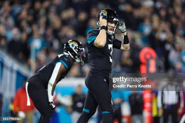 Beathard of the Jacksonville Jaguars looks on from the field during an NFL football game against the Cincinnati Bengals at EverBank Stadium on...