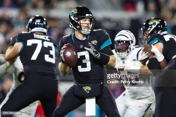 Beathard of the Jacksonville Jaguars drops back to pass during an NFL football game against the Cincinnati Bengals at EverBank Stadium on December 4,...