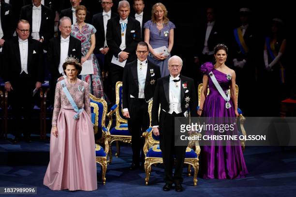 Queen Silvia of Sweden, King Carl XVI Gustaf of Sweden, Crown Prince Daniel of Sweden and Crown Princess Victoria of Sweden attend the Nobel awards...