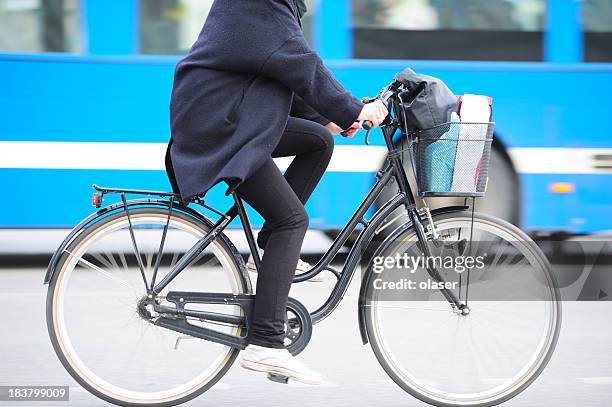 bike in motion blurred traffic - man riding bus stock pictures, royalty-free photos & images