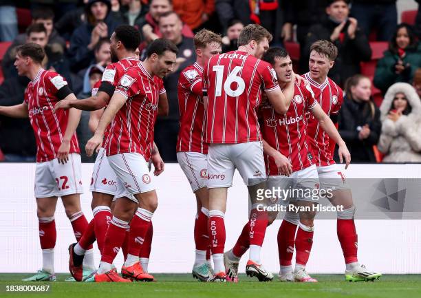 Jason Knight of Bristol City celebrates scoring his team's first goal with teammates during the Sky Bet Championship match between Bristol City and...