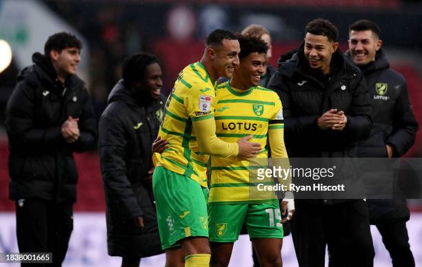 Adam Idah of Norwich City celebrates victory with teammate Sam McCallum during the Sky Bet Championship match between Bristol City and Norwich City...
