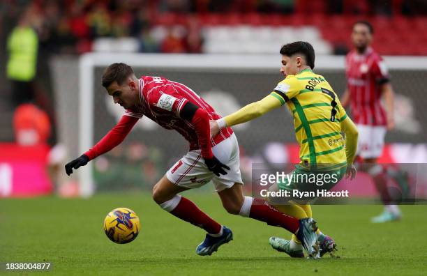 Anis Mehmeti of Bristol City is challenged by Borja Sainz of Norwich City during the Sky Bet Championship match between Bristol City and Norwich City...
