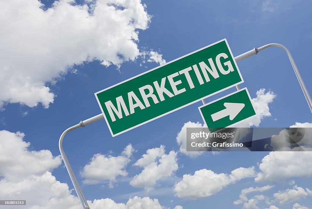 Green highway sign with exit for marketing