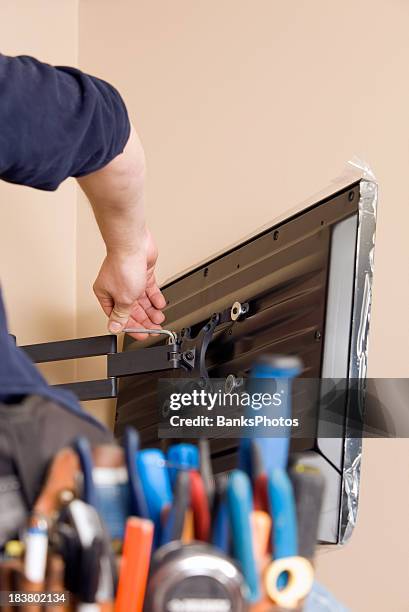 178 Installing New Television Stock Photos, High-Res Pictures, and ...