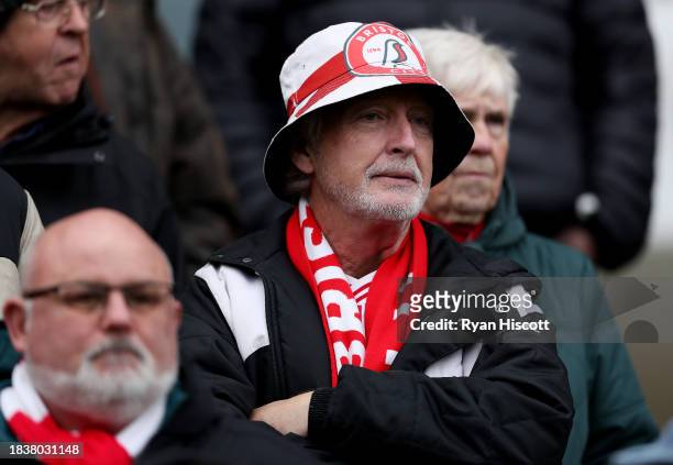 Fan of Bristol City, wearing a scarf and bucket hat, looks on prior to the Sky Bet Championship match between Bristol City and Norwich City at Ashton...