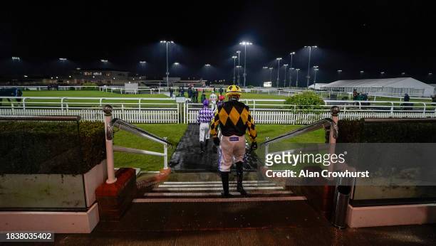 Jockeys leave the weighing room at Chelmsford City Racecourse on December 07, 2023 in Chelmsford, England.