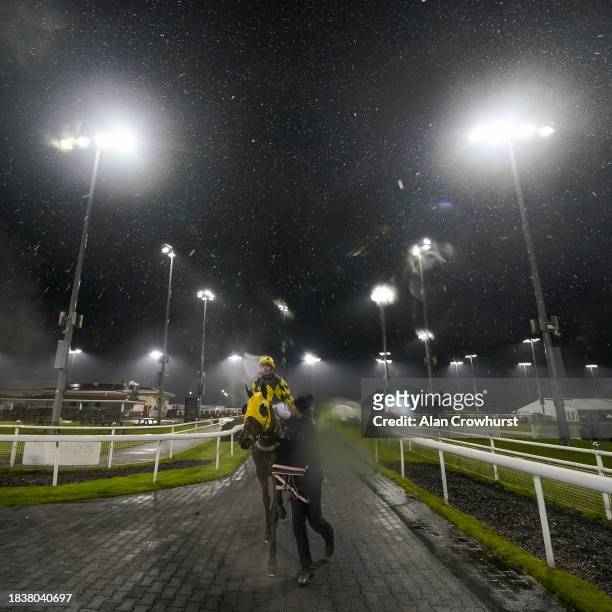 General view as runners return after The Racing Is Everyone's Sport Restricted Maiden Stakes on a wet evening at Chelmsford City Racecourse on...
