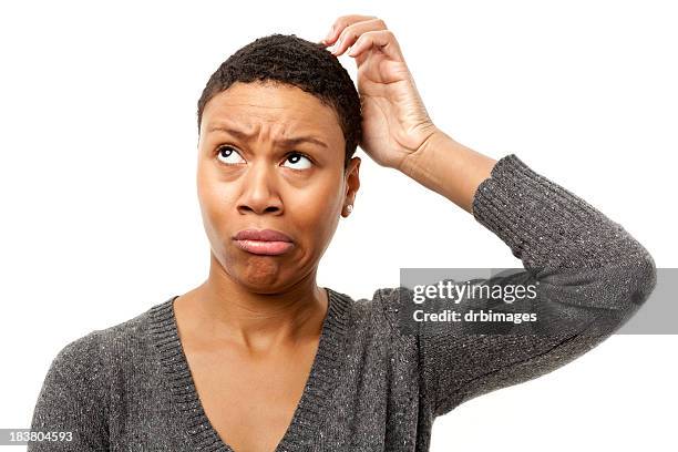 confused young woman scratching head - scratching head stock pictures, royalty-free photos & images