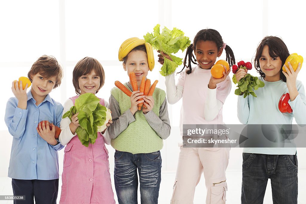 Children playing with vegetables