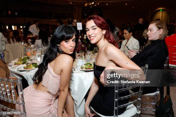 Camila Cabello and Dua Lipa attend The Hollywood Reporter's Women in Entertainment 2023 at The Beverly Hills Hotel on December 07, 2023 in Los...