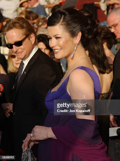 Actress Catherine Zeta-Jones and actor Michael Douglas attend the 9th Annual Screen Actors Guild Awards at the Shrine Auditorium on March 9, 2003 in...