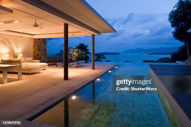 night view of beautiful villa on island - swimming pool night stock pictures, royalty-free photos & images