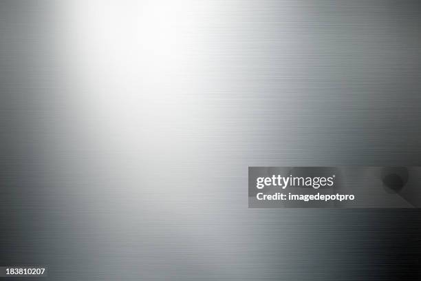 shiny brushed metal background - zilverkleurig stockfoto's en -beelden