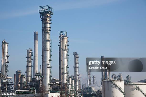 petrochemical plant - distillation column stock pictures, royalty-free photos & images