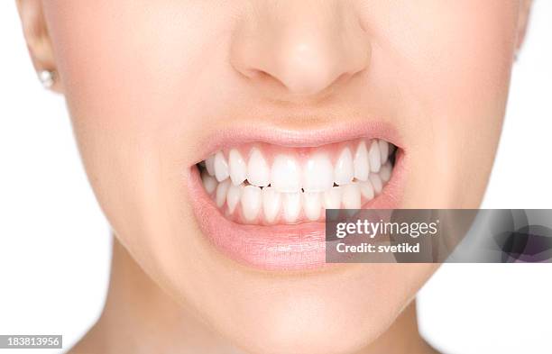 showing teeth - smiling people human teeth stock pictures, royalty-free photos & images