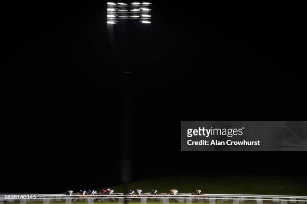 Down the back straight during The tote Guarantee Now At Chelmsford Handicap at Chelmsford City Racecourse on December 07, 2023 in Chelmsford, England.