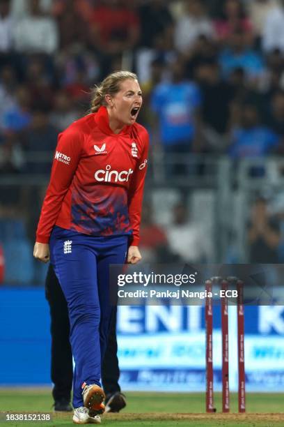 Sophie Ecclestone of England celebrates the wicket of Smriti Mandhana of India during the 3rd T20 International match between India Women and England...