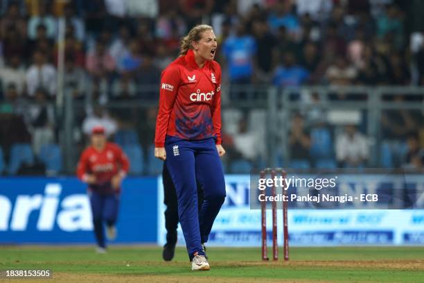 Sophie Ecclestone of England celebrates the wicket of Smriti Mandhana of India during the 3rd T20 International match between India Women and England...