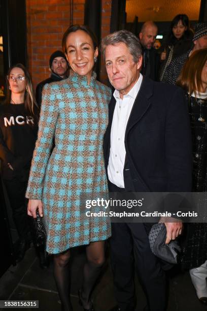 Anna Elisabet Eberstein and Hugh Grant attend the CHANEL Metiers D'Art Show on December 07, 2023 in Manchester, England.