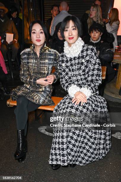 Zhou Xun and Gwei Lun Mei attend the CHANEL Metiers D'Art Show on December 07, 2023 in Manchester, England.