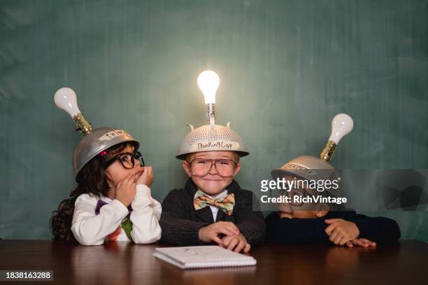 young retro nerds and a boy with an idea - philosophy stock pictures, royalty-free photos & images