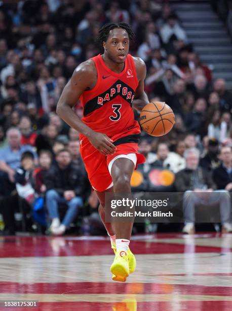 Anunoby of the Toronto Raptors dribbles against the Miami Heat during the second half of their basketball game at the Scotiabank Arena on December 6,...
