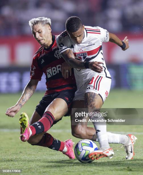 Guillermo Varela of Flamengo and Caio Paulista of Sao Paulo fight for the ball during a match between Sao Paulo and Flamengo as part of Brasileirao...
