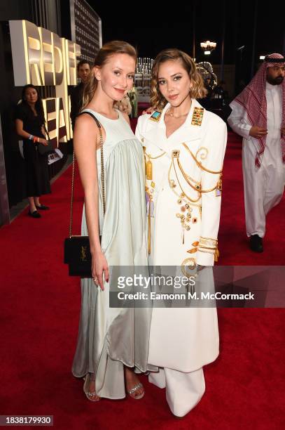 Guest and Fatima Al-Banawi attend the red carpet on the closing night of the Red Sea International Film Festival 2023 on December 07, 2023 in Jeddah,...