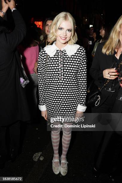 Lucy Boynton attends the CHANEL Metiers D'Art Show on December 07, 2023 in Manchester, England.