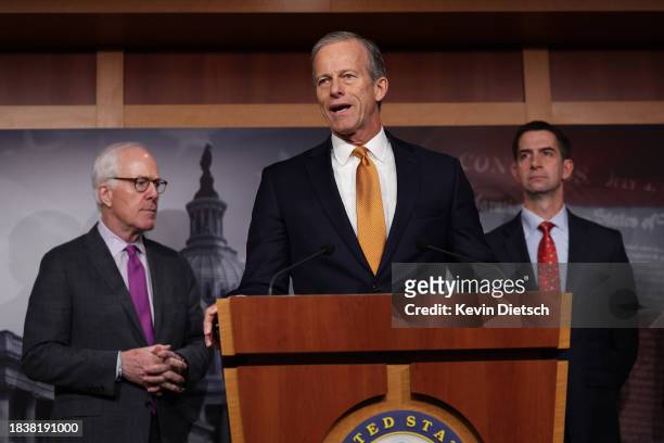 Sen. John Thune , joined by Sen. John Cornyn and Sen. Tom Cotton , speaks at a press conference on border security at the U.S. Capitol on December...