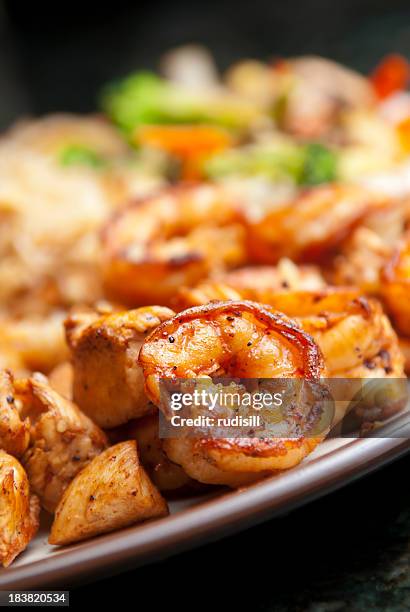 hibachi shrimp and chicken - hibachi stock pictures, royalty-free photos & images