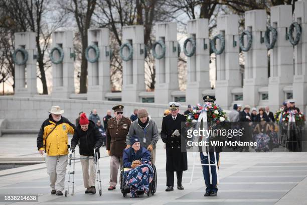 Year-old U.S. Army Air Forces Lt. Col. George Burson and U.S. Army veteran George Arnstein participate in a wreath laying ceremony at the National...
