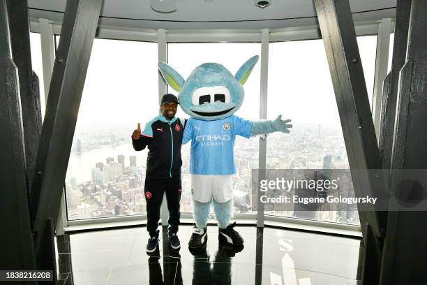 Shaun-Wright Phillips and Moonchester visit the Empire State Building with Manchester City F.C. Treble Trophies at The Empire State Building on...