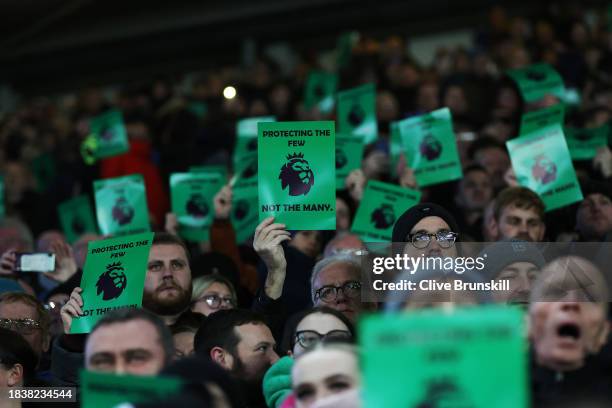 Everton supporters hold protest banners in the stands reading "Protecting the Few, Not the Many" prior to the Premier League match between Everton FC...