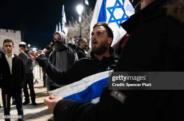 Demonstrators confront a heavy police presence during a protest dubbed the "March of the Maccabees" on December 07, 2023 in Jerusalem. The protest...