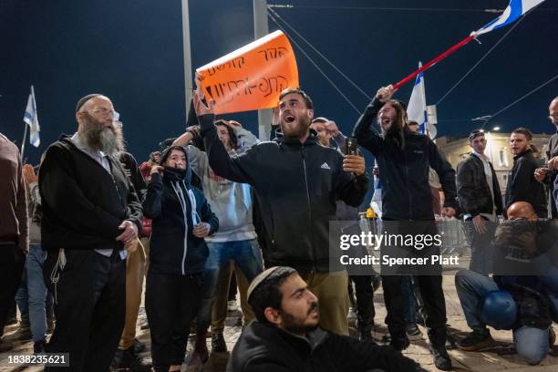 Demonstrators confront a heavy police presence during a protest dubbed the "March of the Maccabees" on December 07, 2023 in Jerusalem. The protest...