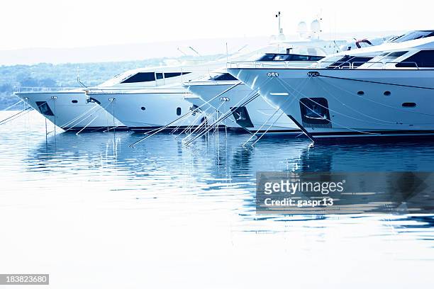 floating luxury - luxury yachts stockfoto's en -beelden
