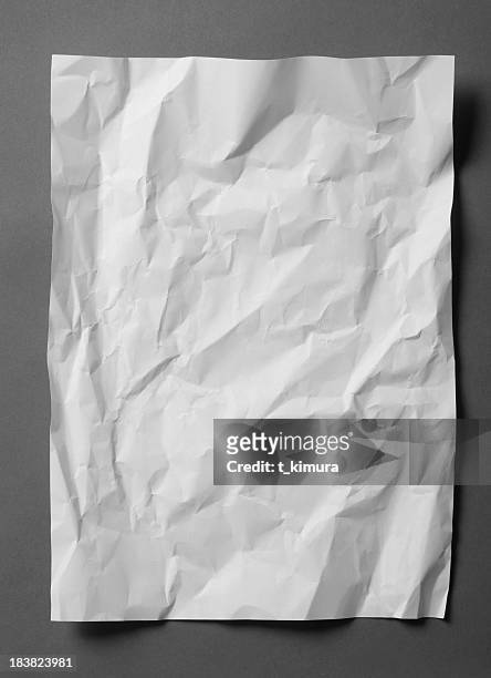 torn paper - wrinkled paper stockfoto's en -beelden