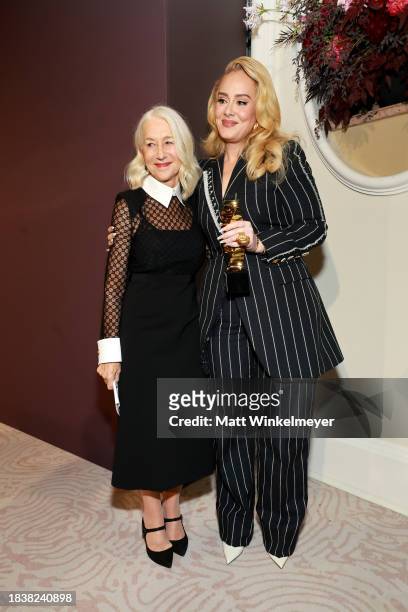 Helen Mirren and Adele attend The Hollywood Reporter's Women in Entertainment 2023 at The Beverly Hills Hotel on December 07, 2023 in Los Angeles,...