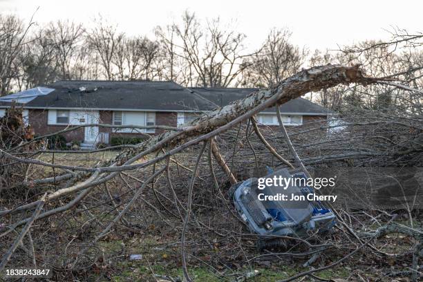 Child's ride-on vehicle is seen amongst downed tree branches in the aftermath of a tornado on December 10, 2023 in Madison, Tennessee. Multiple...