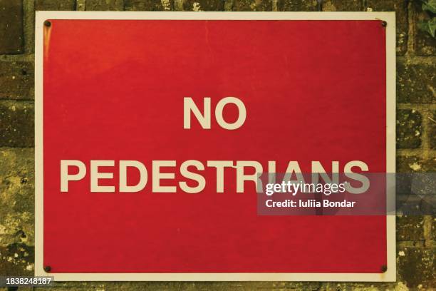 no pedestrians red sign - pedestrian crossing sign stock pictures, royalty-free photos & images