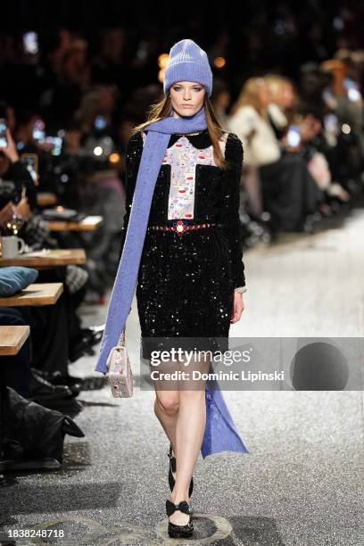 Model walks the runway during the CHANEL Metiers D'Art Fashion Show on December 07, 2023 in Manchester, England.